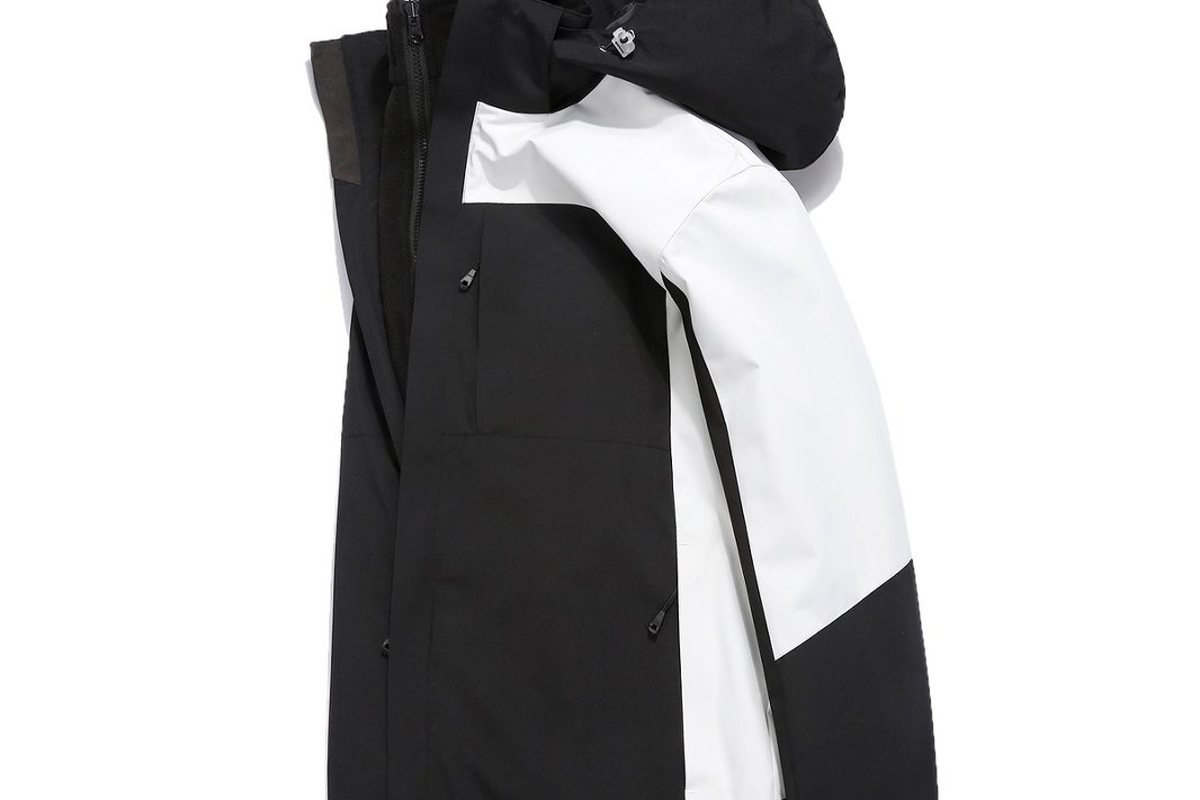 Black 3-in-1 shell shown beside its detachable white liner - Baggy Snowboard Pants Sourcing Guide for Brands (2026)