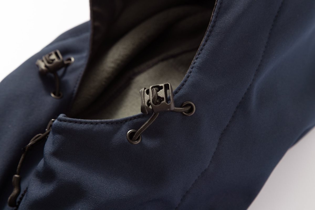 Chest pockets and cord locks on a navy softshell - Breathable Softshell Jacket Manufacturer — Low MOQ, Custom Logo OEM