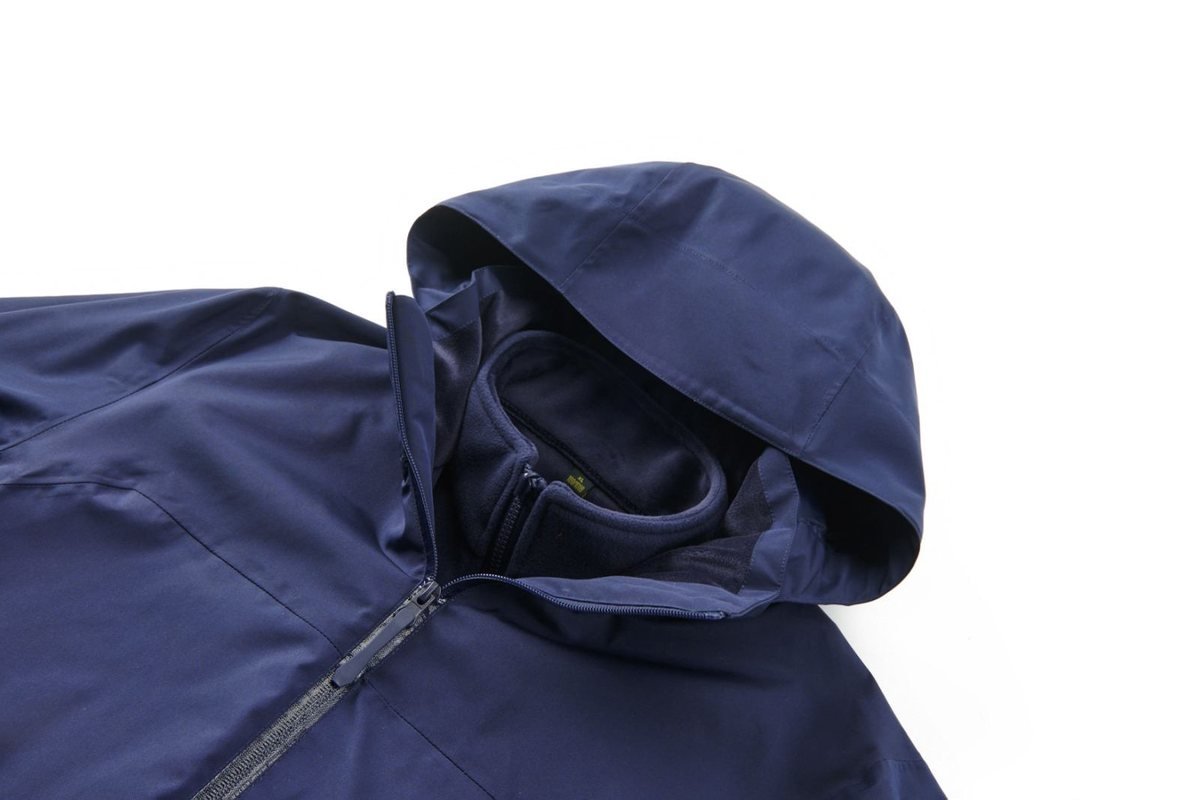 Navy 3-in-1 hardshell jacket, hood three-quarter view - China vs Vietnam Jacket Factory: Quality & Communication Comparison (