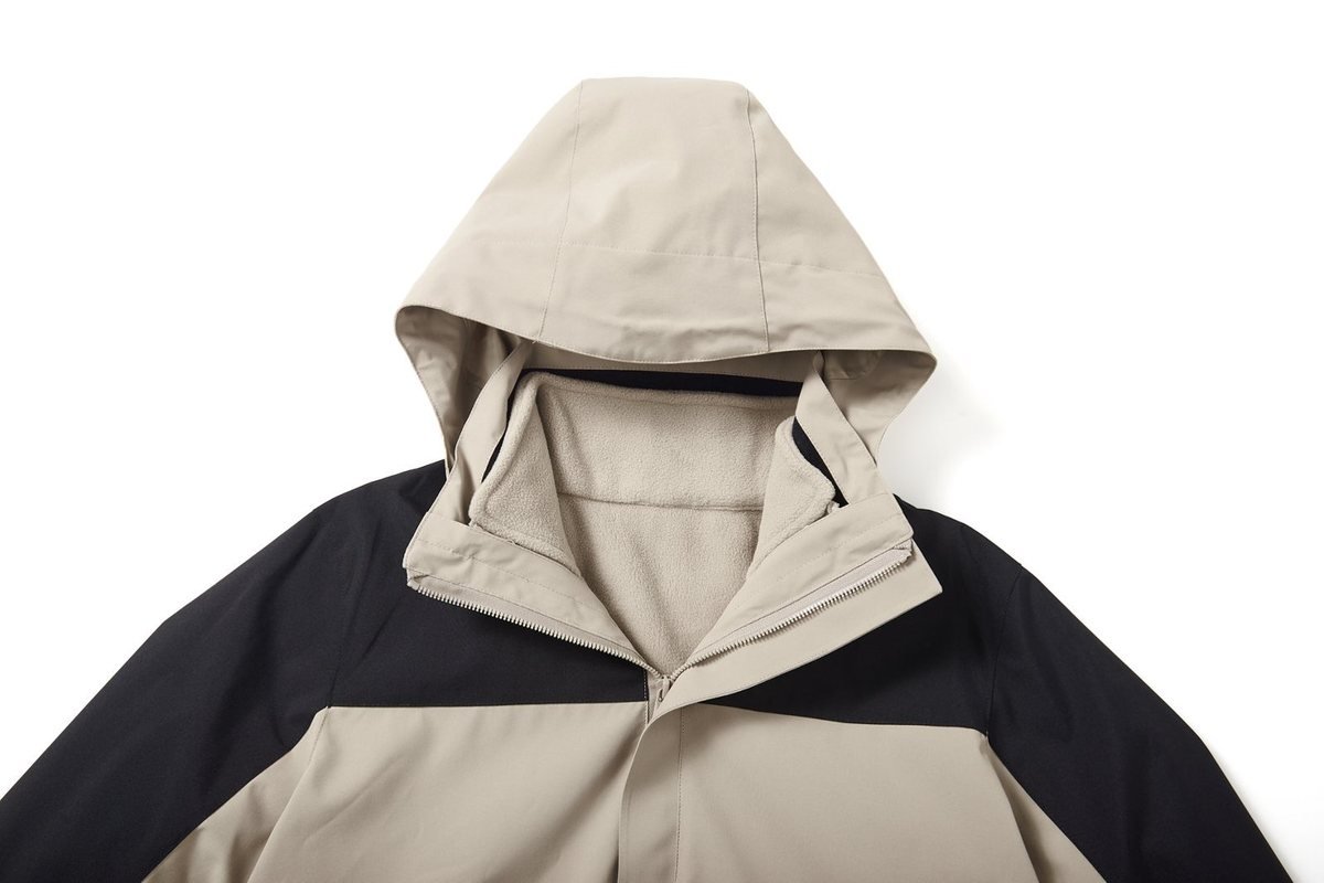 Cream and black colour-blocked hooded shell jacket - DDP Apparel Customs Europe Private Label Jacket (2026 Guide)