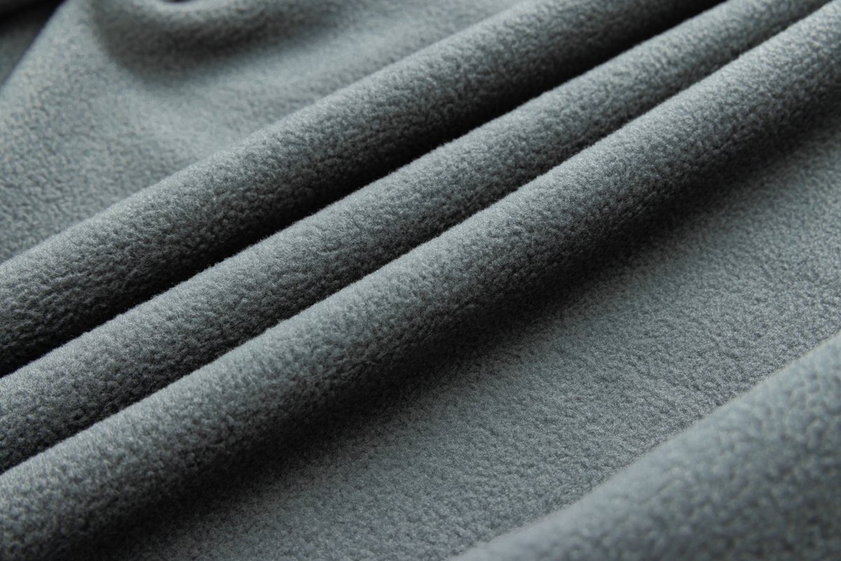 Grey micro-fleece backing of a bonded softshell - Fleece Lined Dog Coat Manufacturer: A B2B Sourcing Guide for DTC Brands & U
