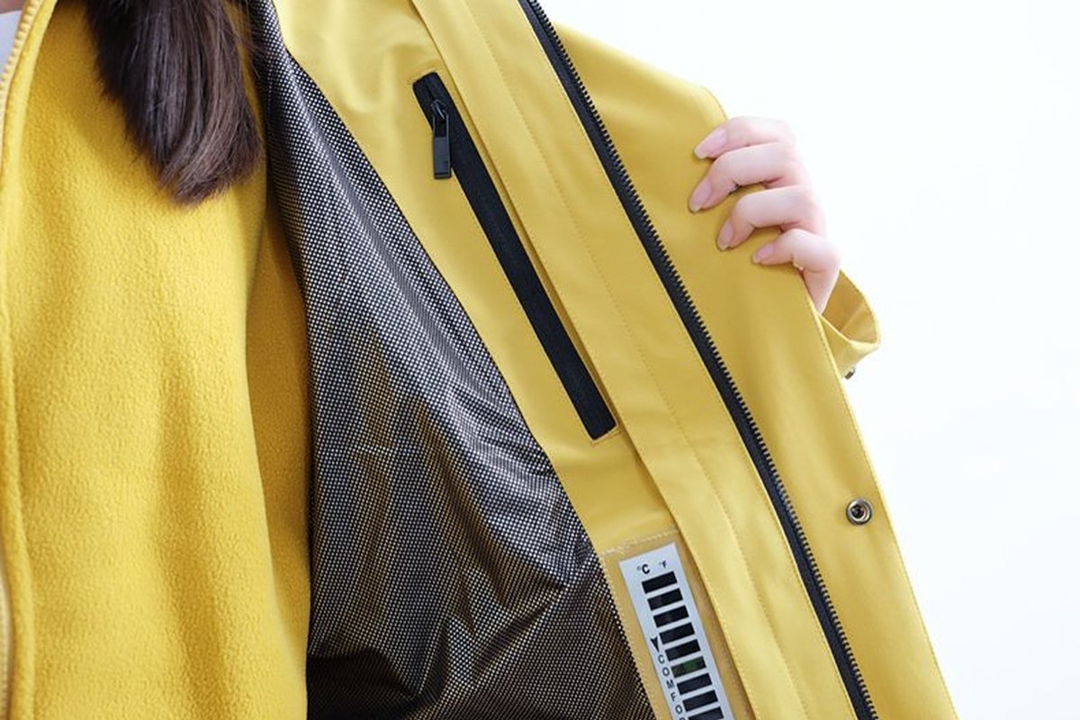 Yellow shell opened to show the taped-seam membrane liner - Gore-Tex Alternatives Compared: Performance, Cost & Best Options