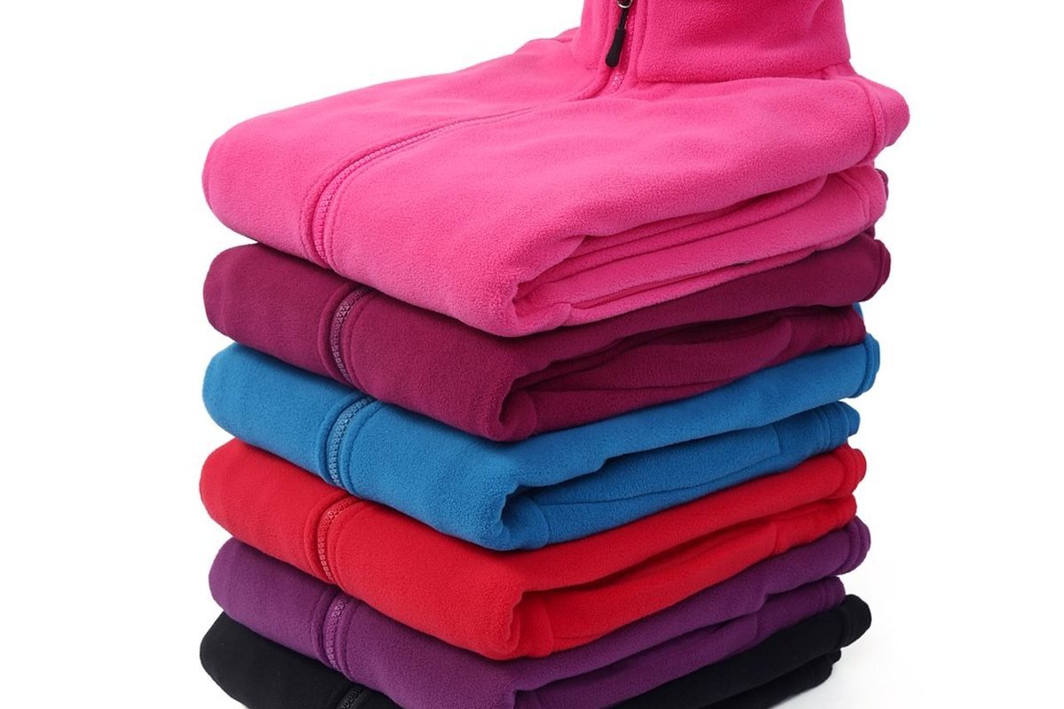 Finished fleece jackets stacked by colourway - OEKO-TEX Pet Apparel Certification: 2026 Guide