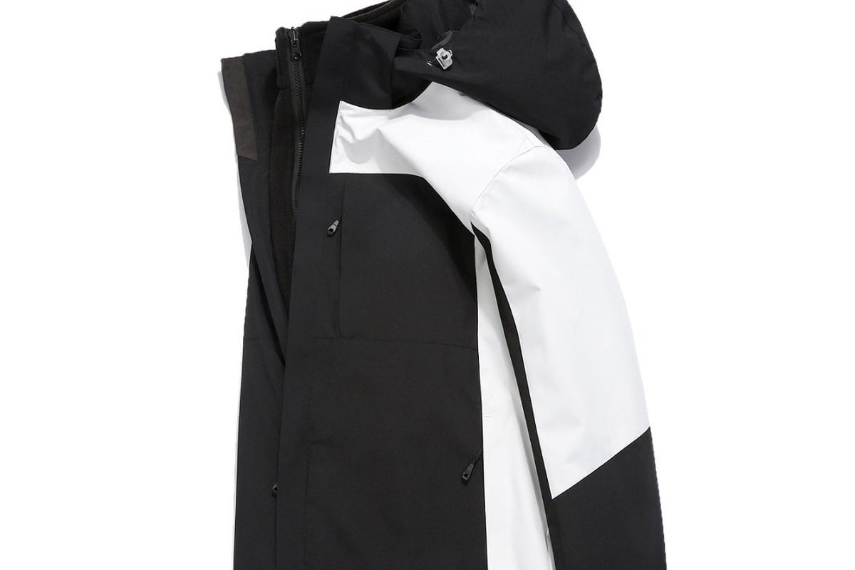 Black 3-in-1 shell shown beside its detachable white liner - Packable Windbreaker Bulk Order Full Container (2026 Guide)