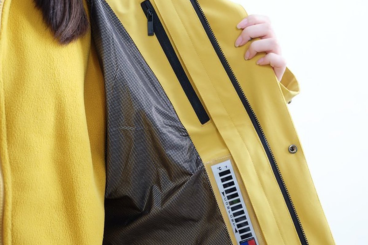 Yellow shell opened to show the taped-seam membrane liner - Reflective Dog Jacket Manufacturer: Custom Waterproof, High-Vis