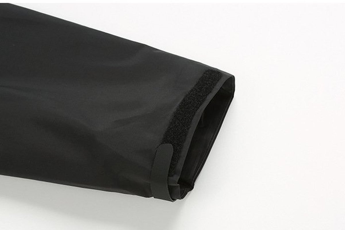 Bonded cuff on a black hardshell jacket - Seam Taping Process Explained: How Waterproof Jackets Keep Water Out