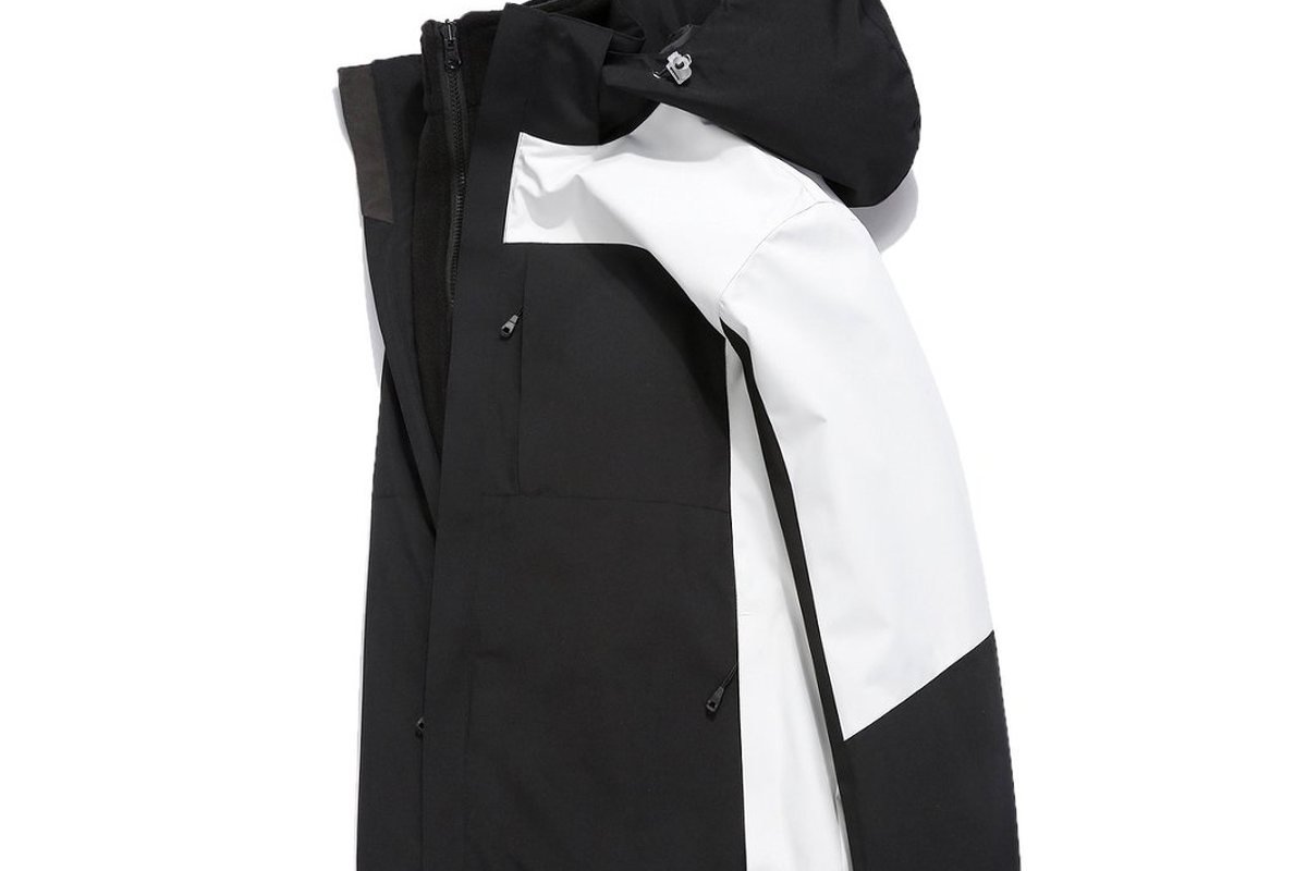 Black 3-in-1 shell shown beside its detachable white liner - Single Prototype Jacket No Branding: Test Factory Quality First
