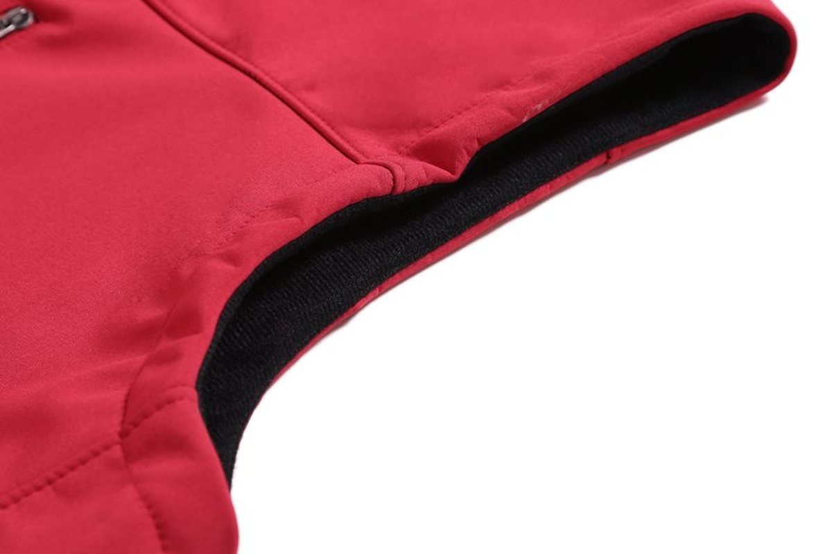 Armhole and fleece lining of a red softshell - Softshell vs Fleece Jacket: Which to Spec for Your Outdoor Line