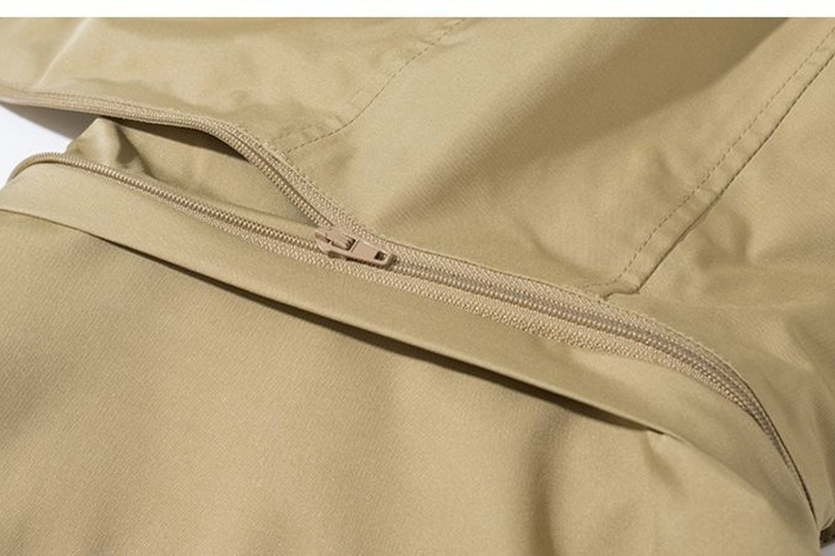 Hip pocket on a khaki hardshell - What Is Pertex Fabric? (2026 Guide for Outdoor Brands)