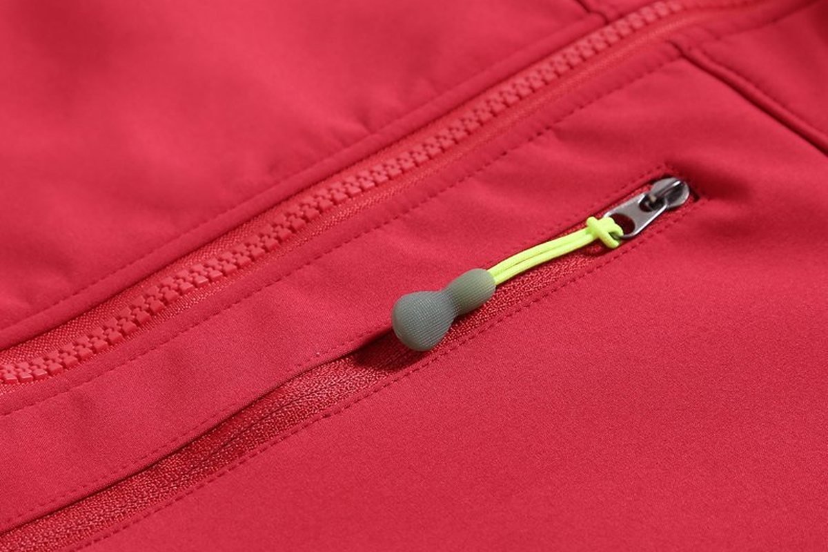Zip pocket with fluoro puller on a red softshell - YKK Aquaguard Zippers: The Complete Buyer's Guide