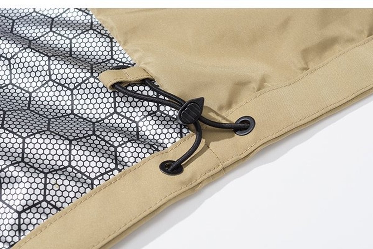 Hex-mesh lined pocket with cord lock on a khaki shell - Zip Vents Snow Pants: B2B Sourcing & Manufacturing Guide (2026)